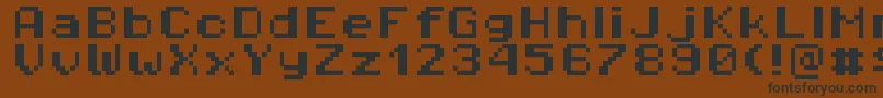 Czcionka Pixeloperatorhb8 – czarne czcionki na brązowym tle