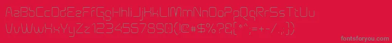 fuente Aunchanted Thin – Fuentes Grises Sobre Fondo Rojo