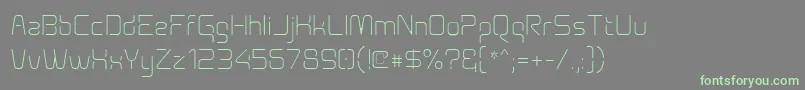 Fonte Aunchanted Thin – fontes verdes em um fundo cinza