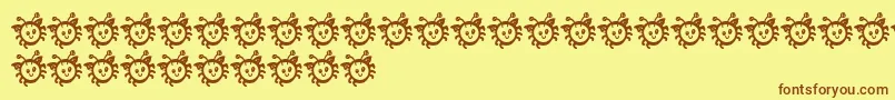 Шрифт CuddleBug – коричневые шрифты на жёлтом фоне