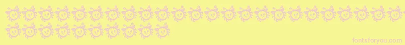 Fonte CuddleBug – fontes rosa em um fundo amarelo