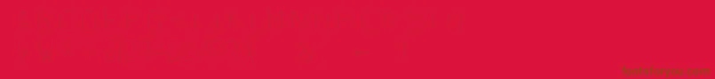 Subtlesansultralight-Schriftart – Braune Schriften auf rotem Hintergrund