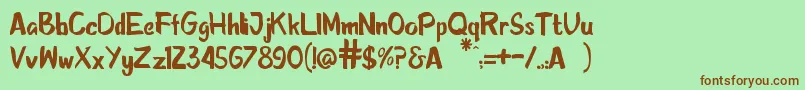 Sketcha-fontti – ruskeat fontit vihreällä taustalla
