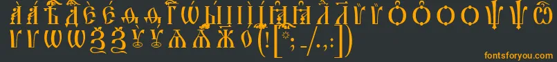 フォントIrmologionCapsIeucsSpacedout – 黒い背景にオレンジの文字