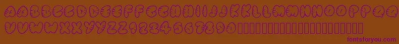 Strippedrounded-fontti – violetit fontit ruskealla taustalla
