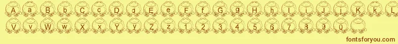 フォントLmsPillToad – 茶色の文字が黄色の背景にあります。