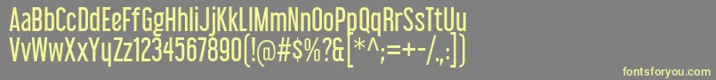LibelSuitRg Font – Yellow Fonts on Gray Background