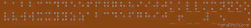 Braille1-Schriftart – Graue Schriften auf braunem Hintergrund