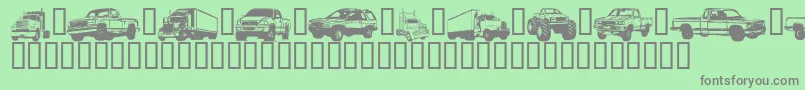 TrucksForJudyS Font – Gray Fonts on Green Background