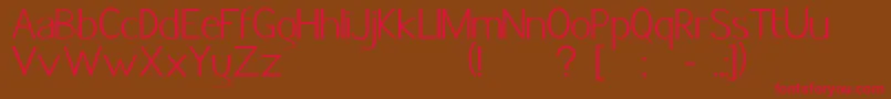 フォントJacksfont – 赤い文字が茶色の背景にあります。