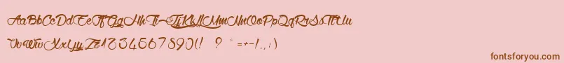 WolfInTheCity-Schriftart – Braune Schriften auf rosa Hintergrund