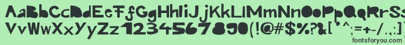 Kroeskop Font – Black Fonts on Green Background