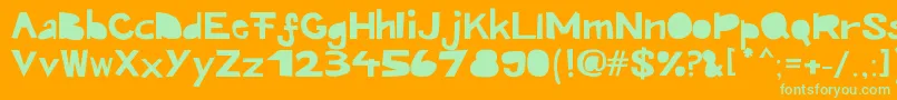 Kroeskop Font – Green Fonts on Orange Background