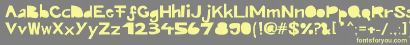 Kroeskop Font – Yellow Fonts on Gray Background