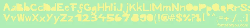 フォントKroeskop – 黄色の文字が緑の背景にあります