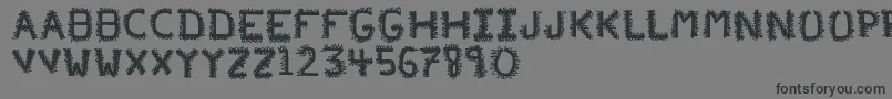 フォントPfVeryverybadfont20 – 黒い文字の灰色の背景