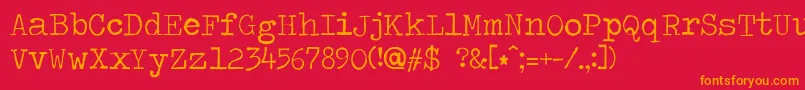 フォントTravelingtypewriter – 赤い背景にオレンジの文字