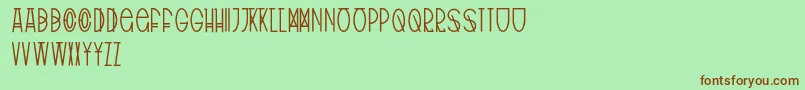 Шрифт TribalType – коричневые шрифты на зелёном фоне