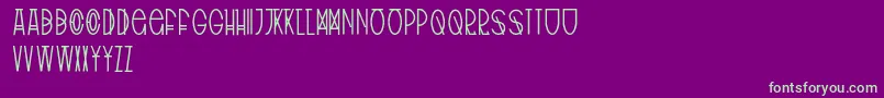 フォントTribalType – 紫の背景に緑のフォント