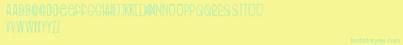 フォントTribalType – 黄色い背景に緑の文字