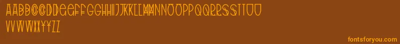 TribalType-Schriftart – Orangefarbene Schriften auf braunem Hintergrund