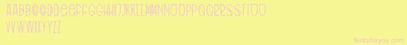フォントTribalType – ピンクのフォント、黄色の背景
