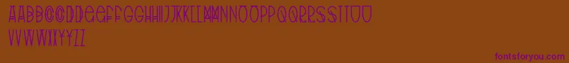 Шрифт TribalType – фиолетовые шрифты на коричневом фоне