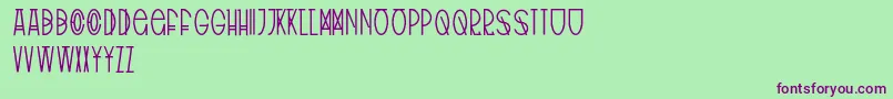 TribalType Font – Purple Fonts on Green Background