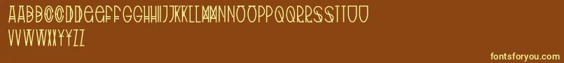 TribalType Font – Yellow Fonts on Brown Background