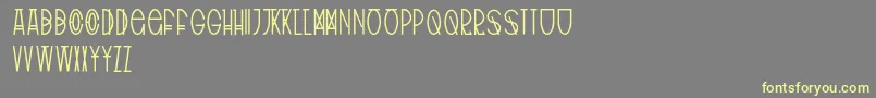 TribalType Font – Yellow Fonts on Gray Background
