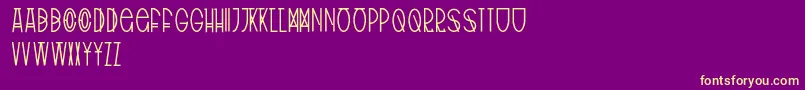 TribalType-fontti – keltaiset fontit violetilla taustalla