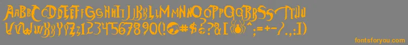 フォントThundercatsHo – オレンジの文字は灰色の背景にあります。