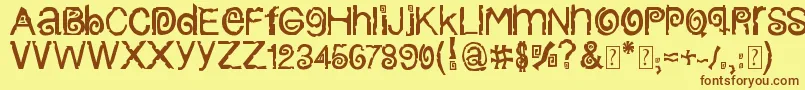フォントColumbiaStroke – 茶色の文字が黄色の背景にあります。