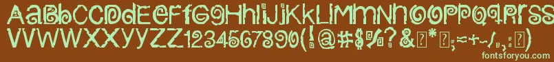 フォントColumbiaStroke – 緑色の文字が茶色の背景にあります。