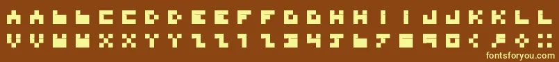 Fonte BdTinyfont – fontes amarelas em um fundo marrom