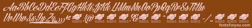 AngillatattooPersonalUseOnly-Schriftart – Rosa Schriften auf braunem Hintergrund