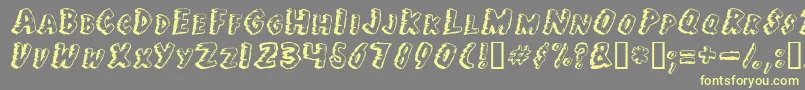 Jungle Fever Font – Yellow Fonts on Gray Background