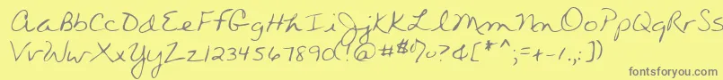 Wendyshand-Schriftart – Graue Schriften auf gelbem Hintergrund