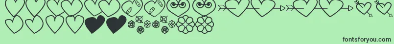 HeartsAndFlowersForValentines Font – Black Fonts on Green Background