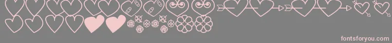 Czcionka HeartsAndFlowersForValentines – różowe czcionki na szarym tle