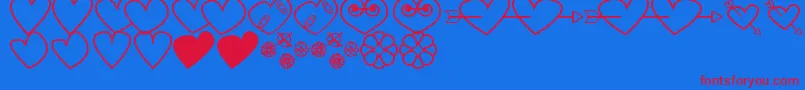 Шрифт HeartsAndFlowersForValentines – красные шрифты на синем фоне