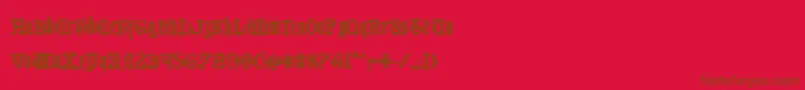 フォントWestdelphiabold – 赤い背景に茶色の文字