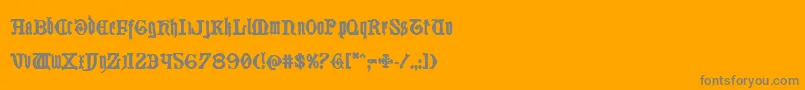 Westdelphiabold-Schriftart – Graue Schriften auf orangefarbenem Hintergrund