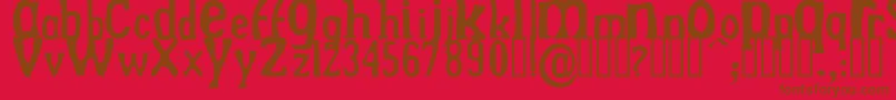 DrekNormal Font – Brown Fonts on Red Background