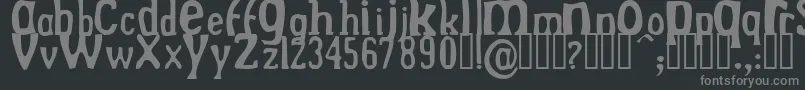 フォントDrekNormal – 黒い背景に灰色の文字
