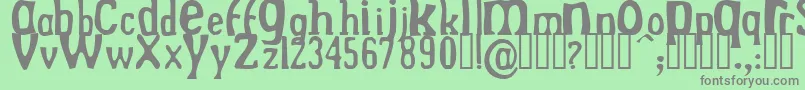 DrekNormal Font – Gray Fonts on Green Background