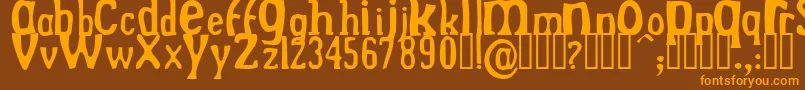 DrekNormal Font – Orange Fonts on Brown Background