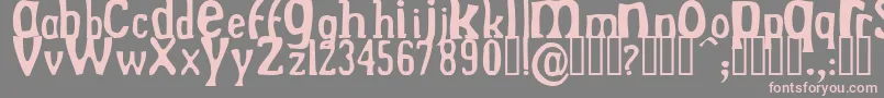 フォントDrekNormal – 灰色の背景にピンクのフォント