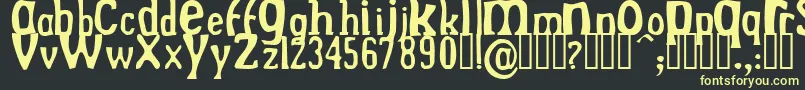 DrekNormal-Schriftart – Gelbe Schriften auf schwarzem Hintergrund