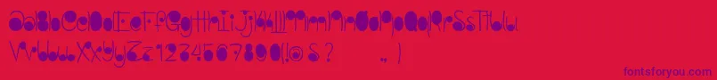 Police LinestonesDemo – polices violettes sur fond rouge